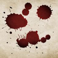 Red drops on a paper background