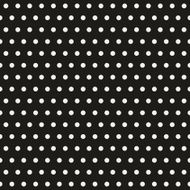 Seamless polka dot pattern on black paper
