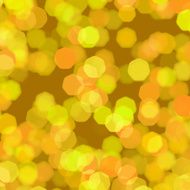 blurred yellow and brown hexagon dots