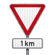 Blank triangular road sign with 1 km ahead to hazard N2
