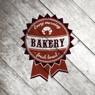Vector Bakery Retro Label on the old wood texture