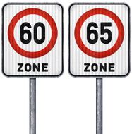 Two rectangular speed limit zone 60 and 65 road signs
