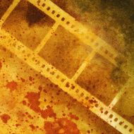 Distressed and textured background with film strip silhouette