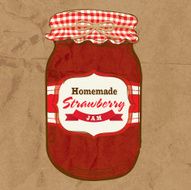 Homemade strawberry jam mason jar with checkered top