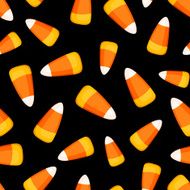 Seamless pattern with candy corn on a black background Vector