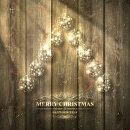 Bright Christmas tree with baubles on light Wooden background