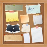 Bulletin board with photos and paper notes