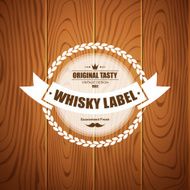 Whiskey label design with wood background