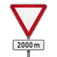 Blank triangular road sign with 2000 meters ahead to hazard N2