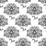 Flowers with ethnic paisley ornaments seamless pattern