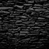 Stone wall black relief texture with shadow