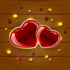 Hearts and beads on wooden background N2