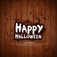 Happy Halloween sign and theme design on wooden background