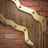 gold on brick background N22
