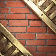 gold on brick background N39