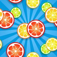 Slices of funny fresh citrus fruits on blue beams background