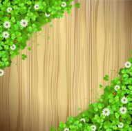 Wood texture with clover and flowers