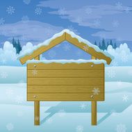 Wood sign on winter landscape