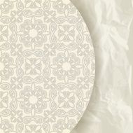 loral pattern on crumpled paper texture