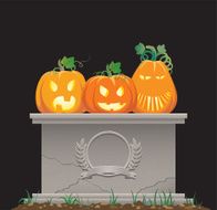 Pumpkins on the tombstone