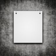 blank hanging on grunge wall