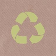 Recycle symbol on a cardboard background