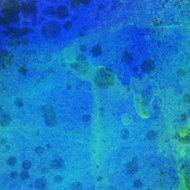 Blue Background with paint splatters and texture