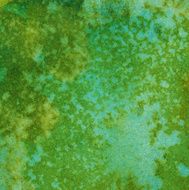 Vibrant green textured and spotted background