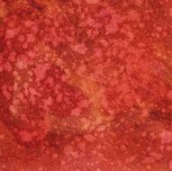 Red textured background with spots