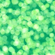 blurred dots on light green background