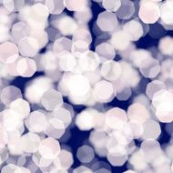 blurred white lights on blue
