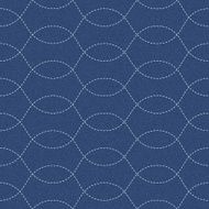 Embroidery ornament with white stitch waves on blue jeans background