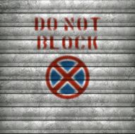 weathered garage door with airbrushed do not block text vector