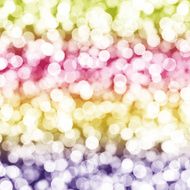 blurred white dots on pastel gradient