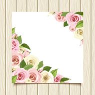 White card with pink and white roses on wooden background