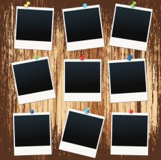 Polaroids On Wood Background