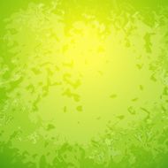 Abstract green background with bright center spotlight and dark