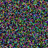 very small multi-color dots on black background