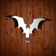 Paper Halloween Bat card on wooden background
