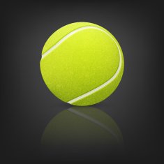 Tennis ball on a reflective surface in the darkness