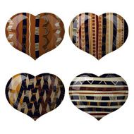 Set of glass hearts with African texture inside