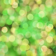Blurred green and yellow bokeh dots