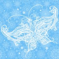 Big lacy butterfly on light winter background