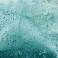 Abstract background hand painted with light turquoise watercolors