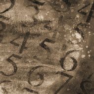 Distressed texture with numbers and in sepia tones