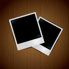 photo frames on wooden background N2