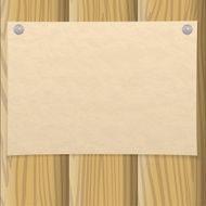 Paper sheet on wooden wall