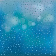 Water Drops on Glass Blue Blur Background