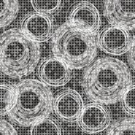 Monochrome pattern of hand-drawn circles on background with polka dots