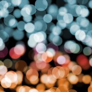 blurred dots on dark background